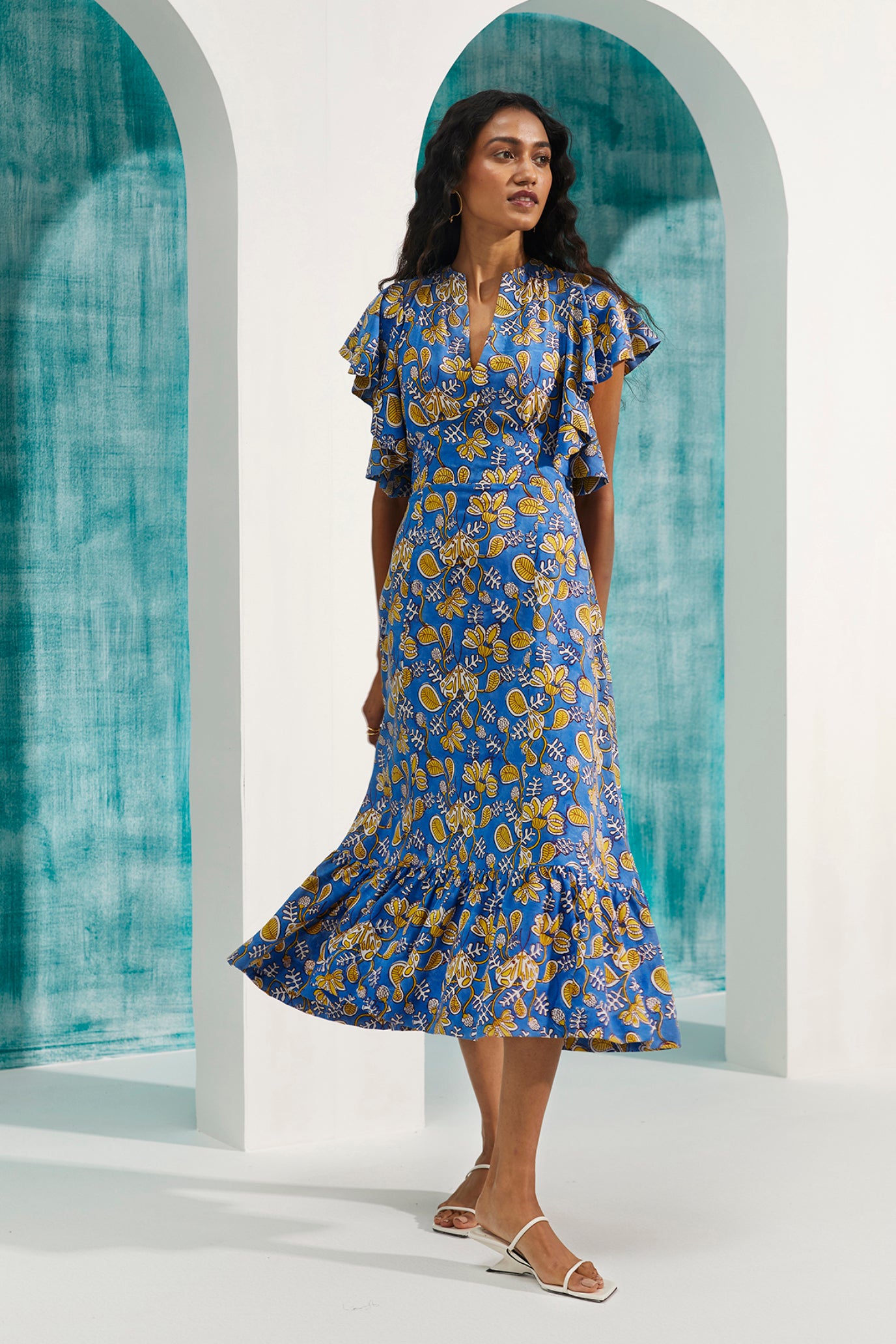sustainable-handmade-handcrafted-jodi-thejodilife-block-printed-blue-yellow-floral-flouncy-sleeves-tiered-hemline